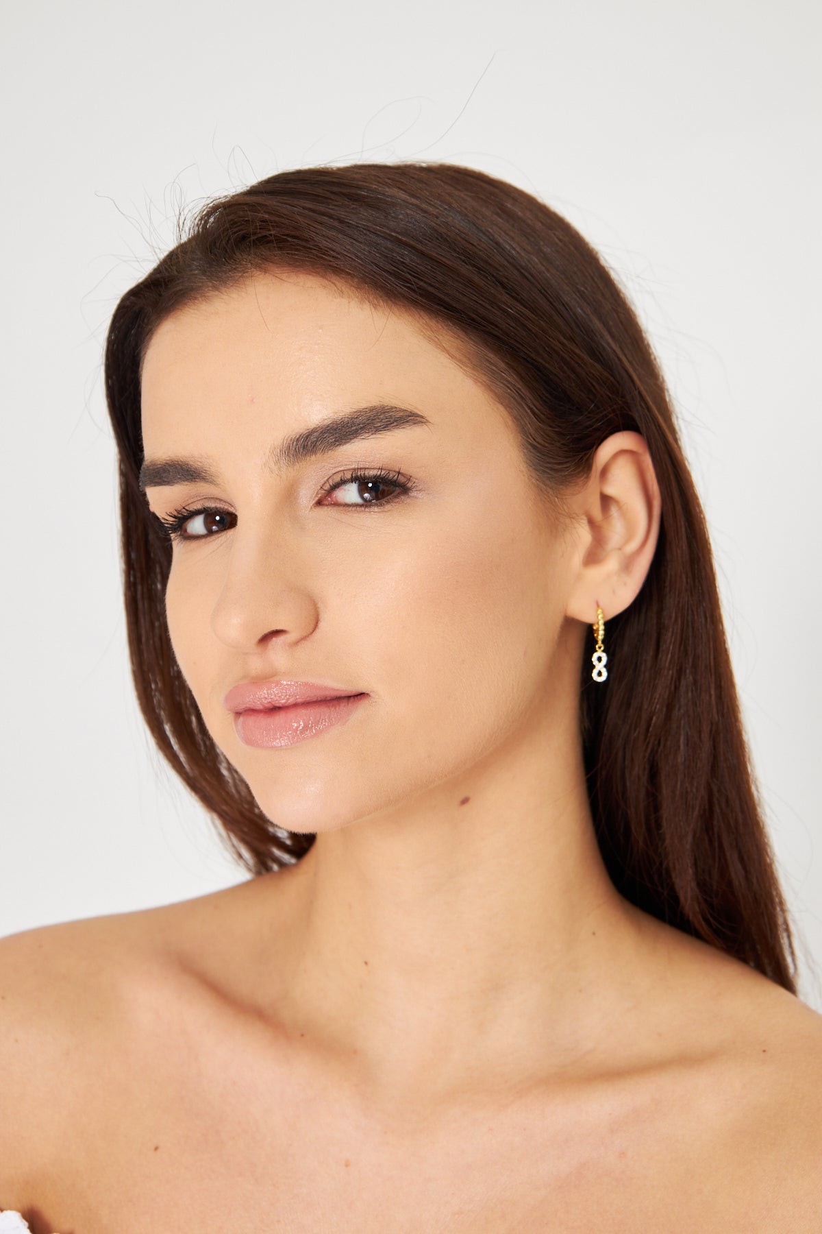 Gold Hoop Earring with Infinity Symbol Pendant and Zircon Stones