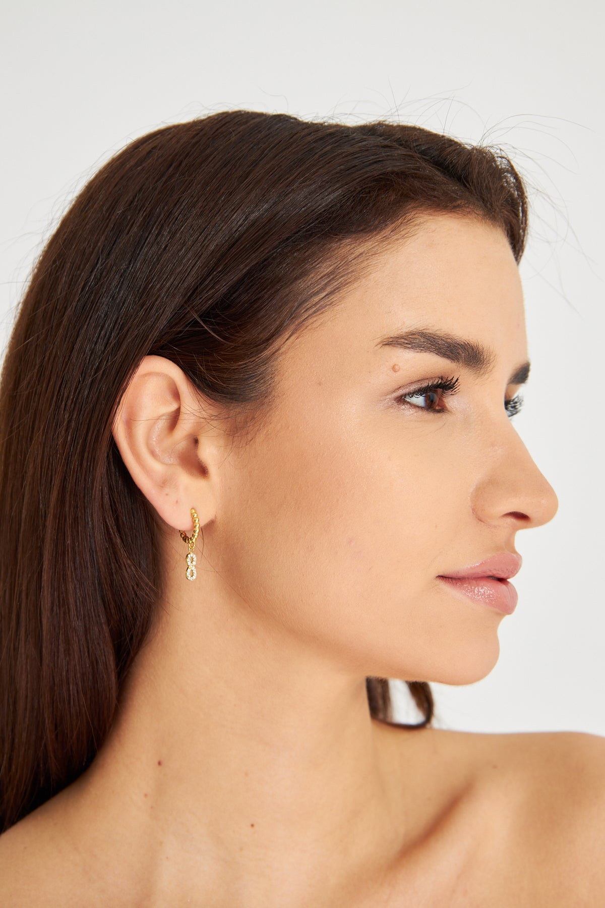 Gold Hoop Earring with Infinity Symbol Pendant and Zircon Stones