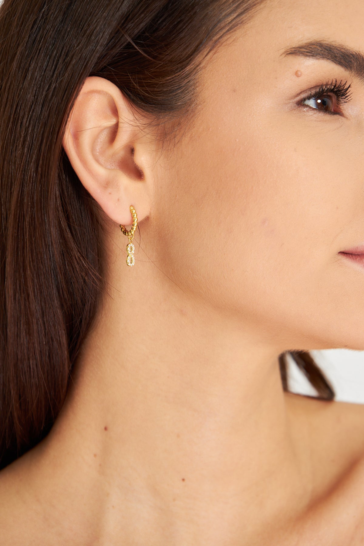 Gold Hoop Earring with Infinity Symbol Pendant and Zircon Stones